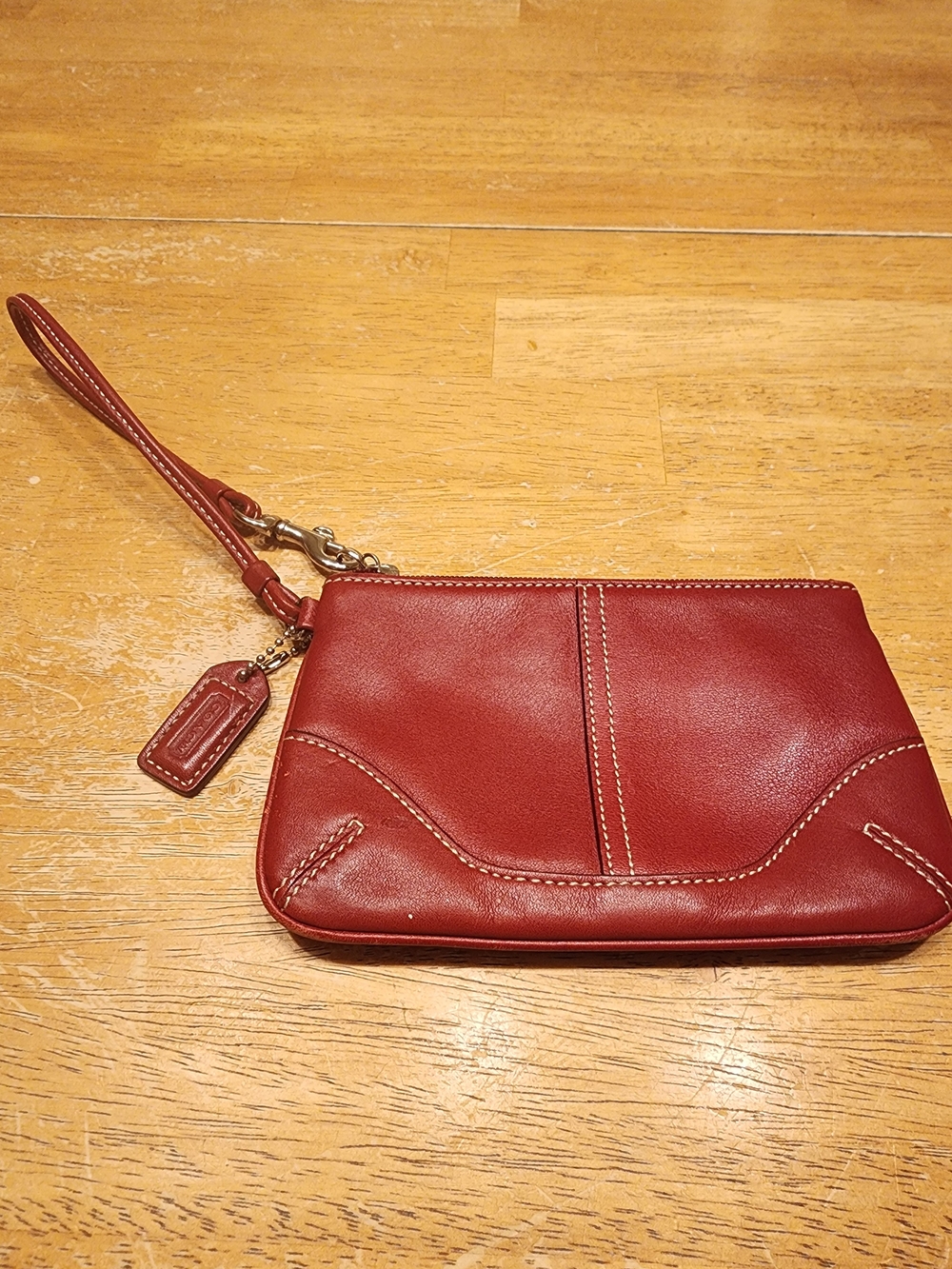 vintage Coach red leather Soho mini wristlet pouch featuring white contrast